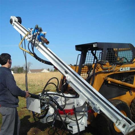 drilling attachment for skid steer|skid steer mounted rock drill.